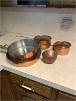 Copper cookware and ladle.  Note for pick up:
