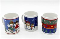 Lot of Three Cartoon Christmas Mugs - Angels, Snow