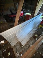 Metal roof sheeting or siding