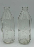 2 Pyrex glass measuring bottles