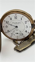 Frank H. Niehaus brass pocket watch w/fob