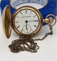 Elgin brass pocket watch w/ chain