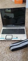 HP laptop with charging cord and carrying case -