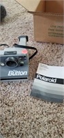 Polaroid button land camera - living room