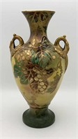 Ornate vtg. pottery dual handle vase
