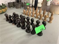 LOT OF CARVED WOOD AFRICAN CHESS PIECES