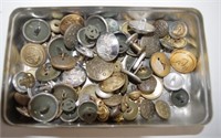 Tin of various military buttons