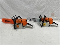 2 toy Stihl chainsaws