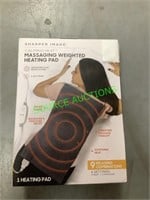 Sharper image massaging weighted heating pad