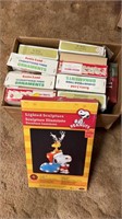 Box of vintage Santa Land Christmas ornaments and