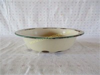 Green rimmed cream colored enameled bowl