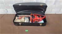Homelite gas chainsaw with case etc.