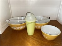 Pyrex bowls by Corning and a Tupperware shaker