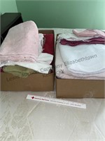 Two box  of washcloths and towels