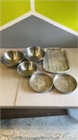 3 stainless steel mixing bowls, 2 metal cake pans