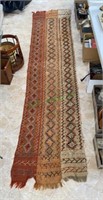 Antique Middle Eastern rug measures 123 x 29 -