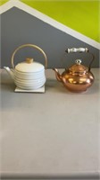 2 Teapots - 1 is white enamel finished metal with