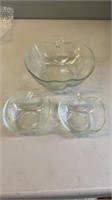 Set of glass apple-shaped serving bowls. One