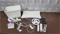 Wii gaming controllers, wheel, board, and more