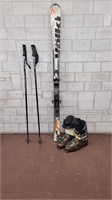 Skiis, boots, and poles in good condition