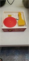 Fisher price record player with 6 disks songs on