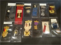 Collection of 12 antique medals and badges -