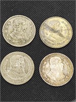 Four vintage silver Mexico one peso coins