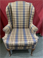 Wingback chair on cabriole legs.