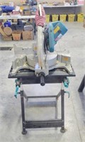 Makita LS1212  12" Compound Miter Saw on a stand