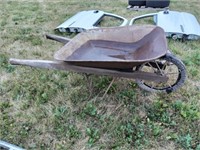Old metal wheel barrow