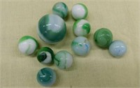 11 vintage glass marbles including 1 shooter