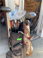2 sets of golf clubs w/bags
