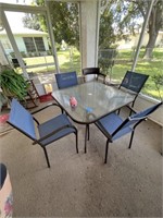 Glass patio furniture with 4 chairs