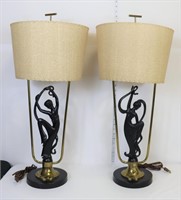 Pair of MCM black figural base lamps