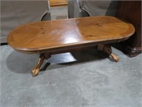 SOLID OAK CLAW FOOTED OVAL COFFEE TABLE