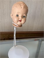 Creepy Doll head and doll stand