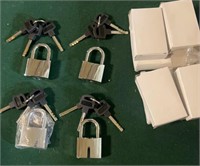 FOUR LOCKS WITH KEYS