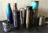 Insulated mugs and tumblers