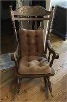 Wood pressed back rocking chair