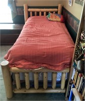 Turned pine twin bed