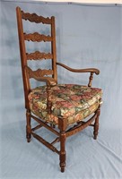 Walnut Carved Arm Chair 45"h,24"w, 21"d