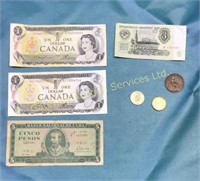 2 $1 Canadian bills (1974) Cuban peso (1986) A