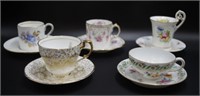 Five various porcelain coffee cups and saucers
