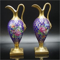 Good antique pair porcelian gilded ewers