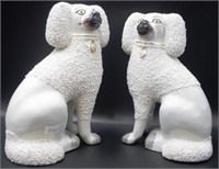Pair of antique Staffordshire seated spaniels