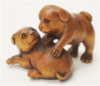 Japanese carved boxwood Dogs netsuke