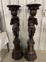 Pair of Greco-roman carved walnut torcheres