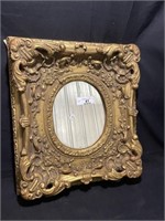 Renaissance Italian revival carved gilt mirror