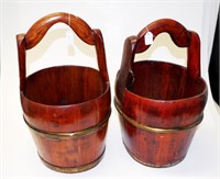 Two Chinese red lacquered water buckets