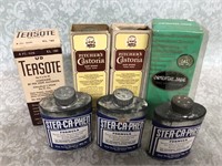 Vintage medicine bottles with boxes and powder